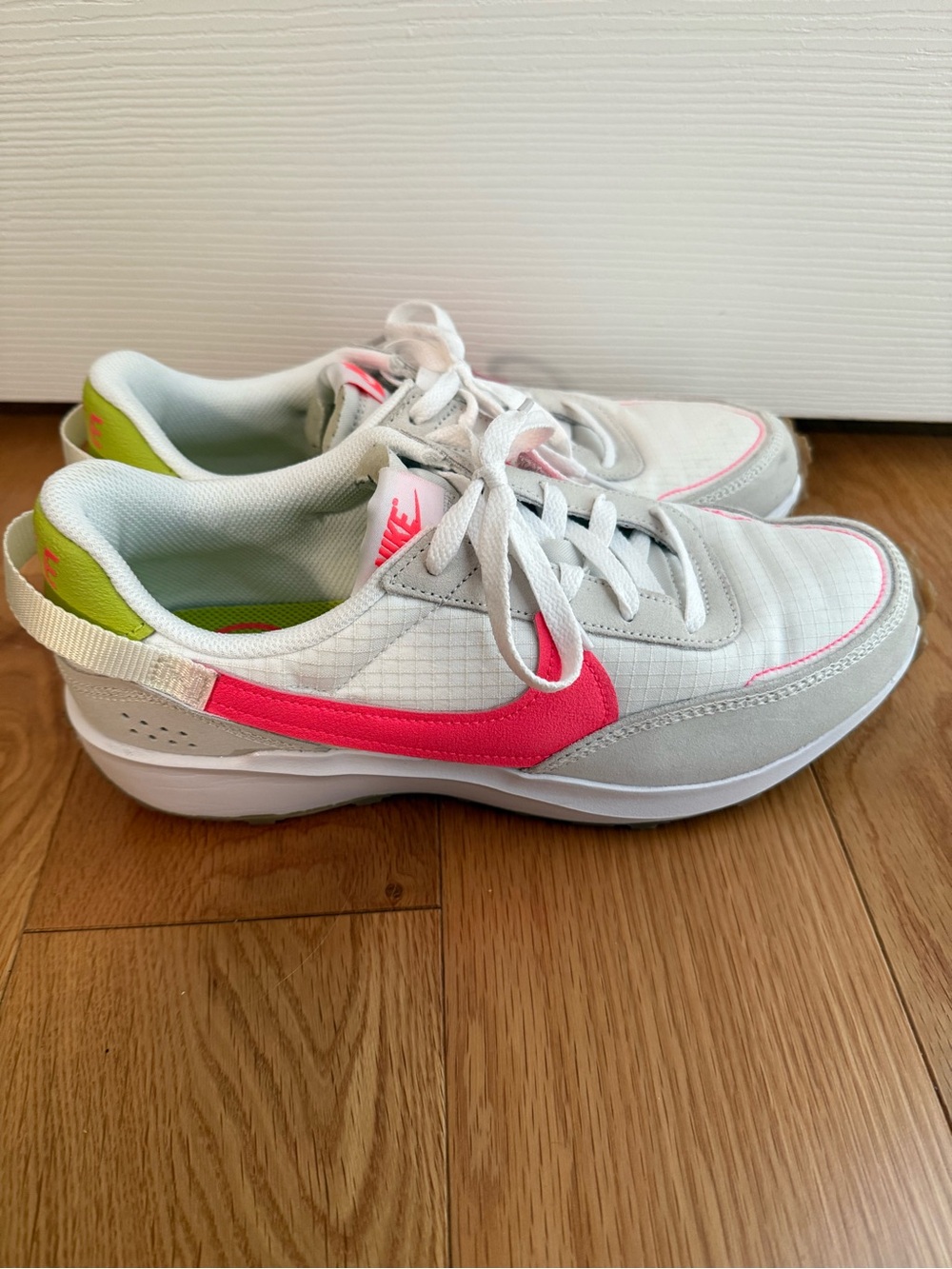 Nike Women’s White Sneakers with Bright Pink Swoosh